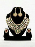 Gold tone emerald set