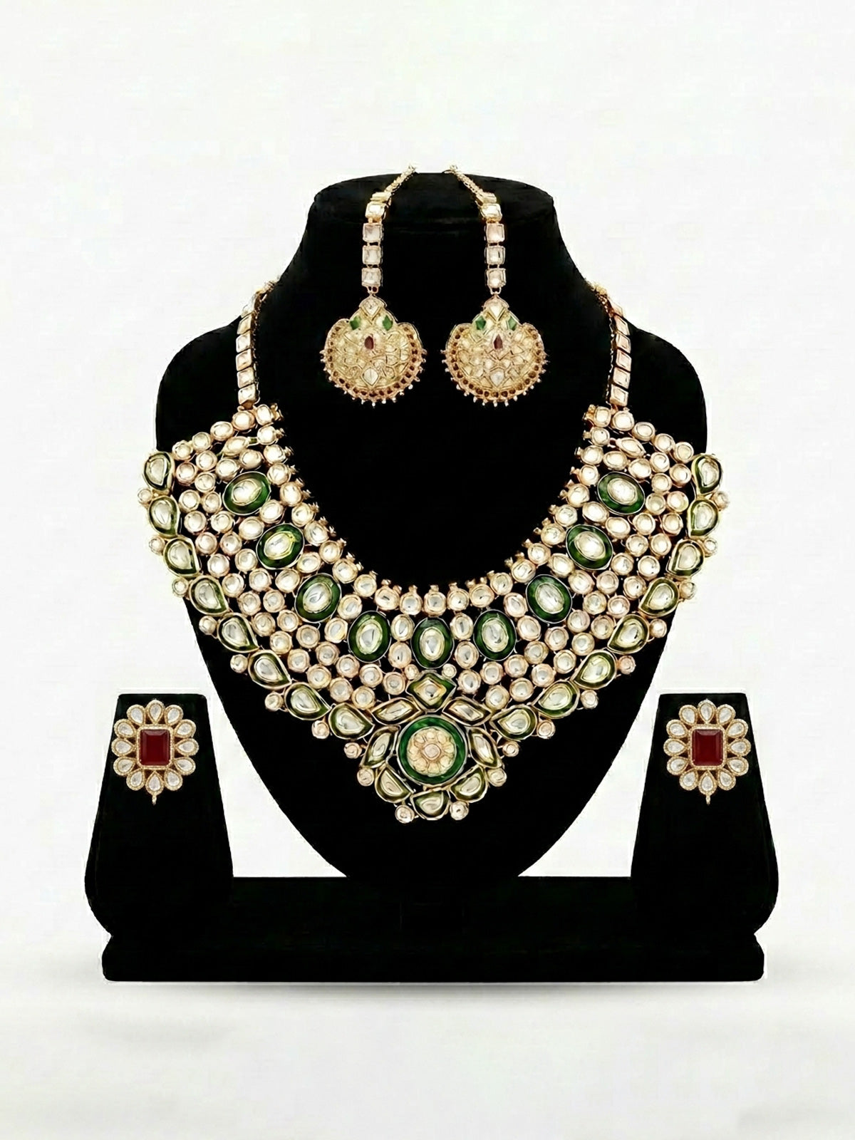 Gold tone emerald set