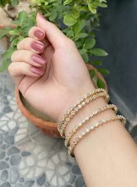 The Golden Halo Bangles