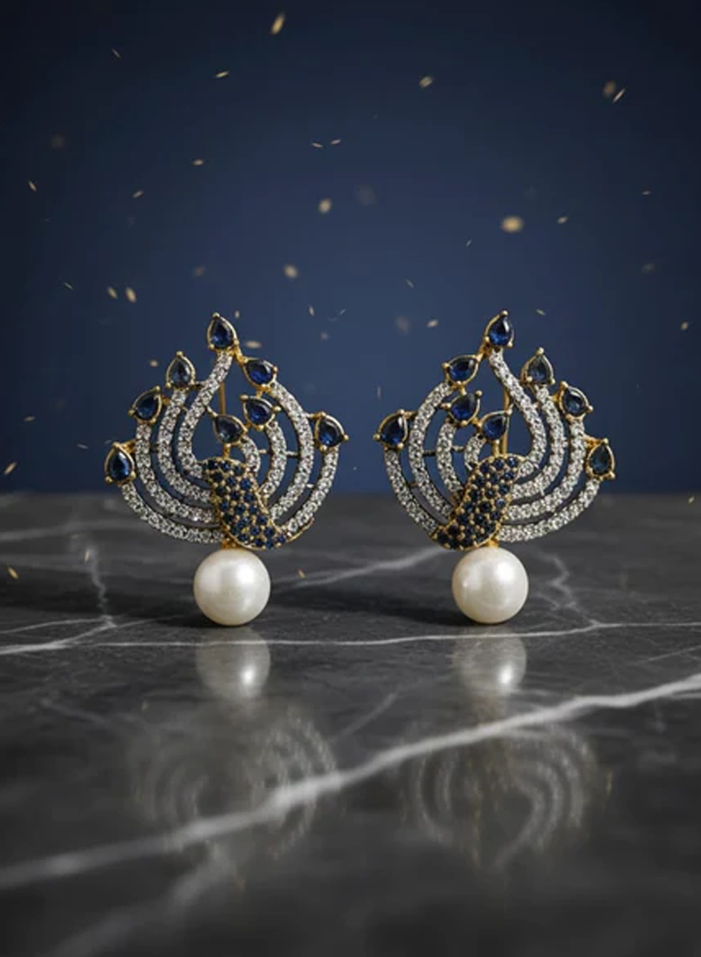 Blue pearl drop peacock motif stud earings