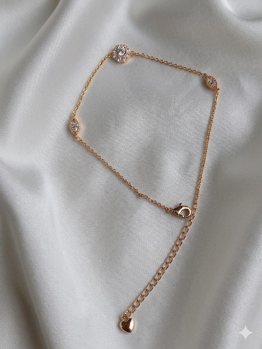 Diamond cut golden bracelet with diamenties